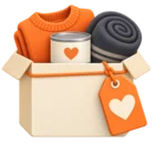 Box of donated goods with a gift tag tied to it